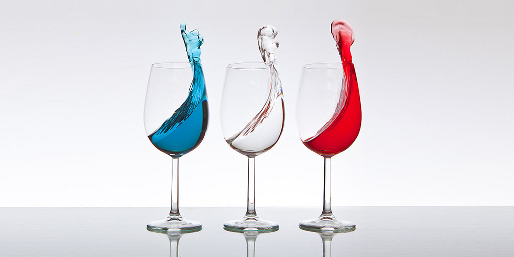 Blue, white and red colored wine