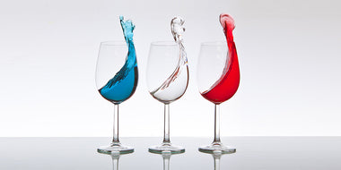 Blue, white and red colored wine