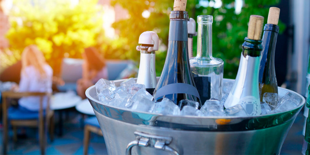 wines chilling in ice bucket on table