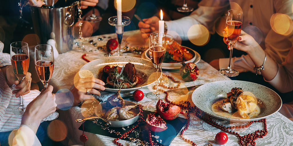 Family and friends celebrating the holidays with champagne