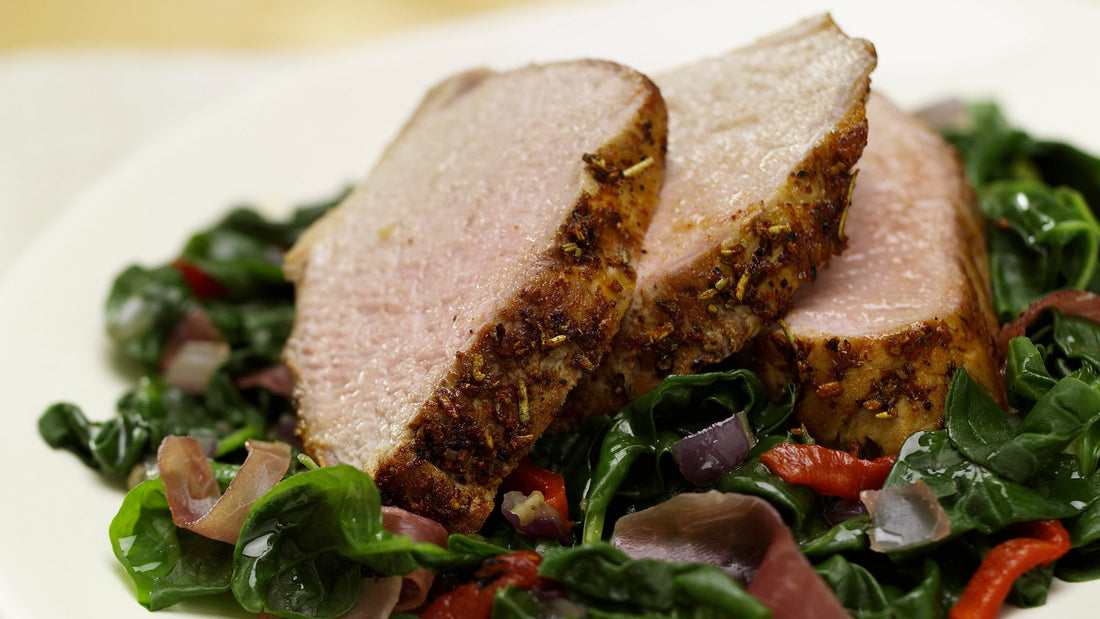 Rosemary Pork Tenderloin on a Bed of Spinach, Roasted Red Peppers and Prosciutto