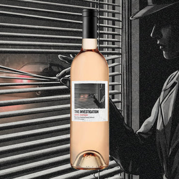 Bottle of wine labeled 'The Investigation' with a person in the background, peeking through window blinds.