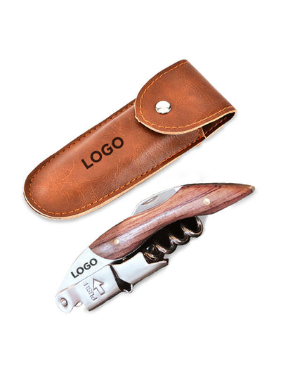 A folding corkscrew with a polished wood handle and silver metal blade, shown alongside its brown leather sheath on a plain white background. Both pieces feature the word 'LOGO' printed on them.