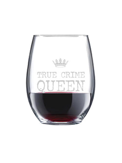 A clear stemless wine glass filled with red wine, featuring a gray frosted graphic of a crown and the text 'TRUE CRIME QUEEN' on the front, set against a plain white background.