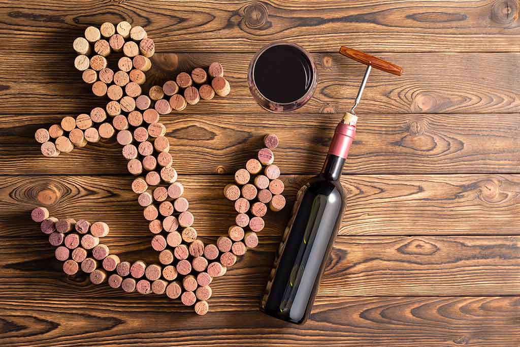 Crowd-Pleasing Tasting Themes - nautical anchor made of corks with a wine bottle and glass