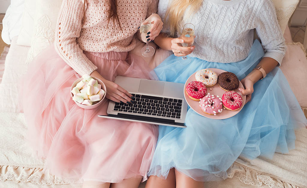 Sorority sisters having sweets with wine while on a Virtual Tasting