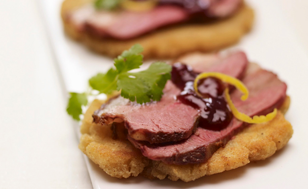 Spiced Duck Arepas and Blueberry Port Sauce