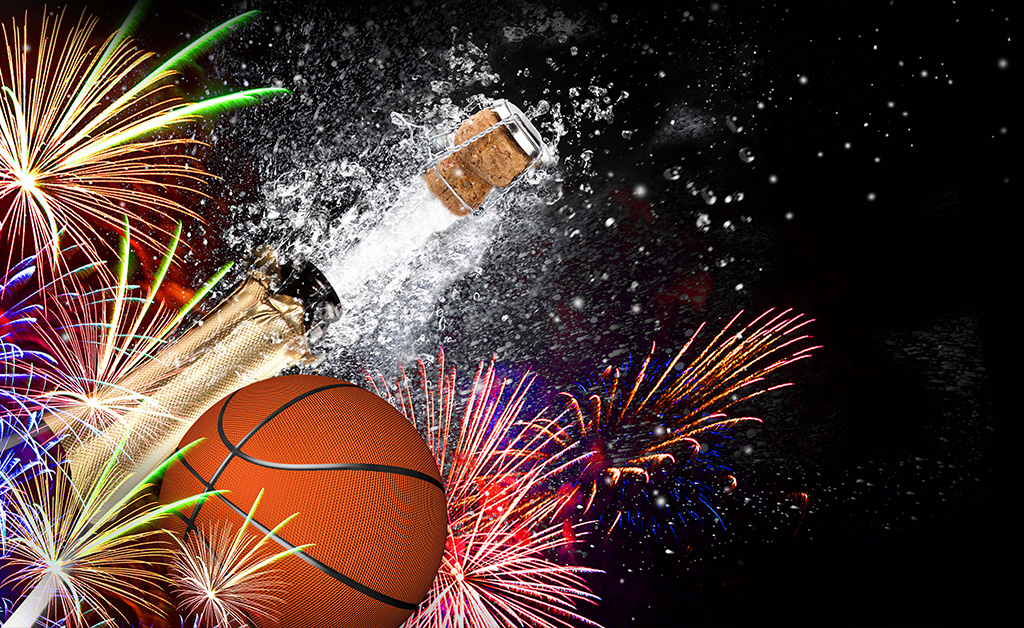 Basketball with fireworks and an exploding bottle of champagne on a black background.