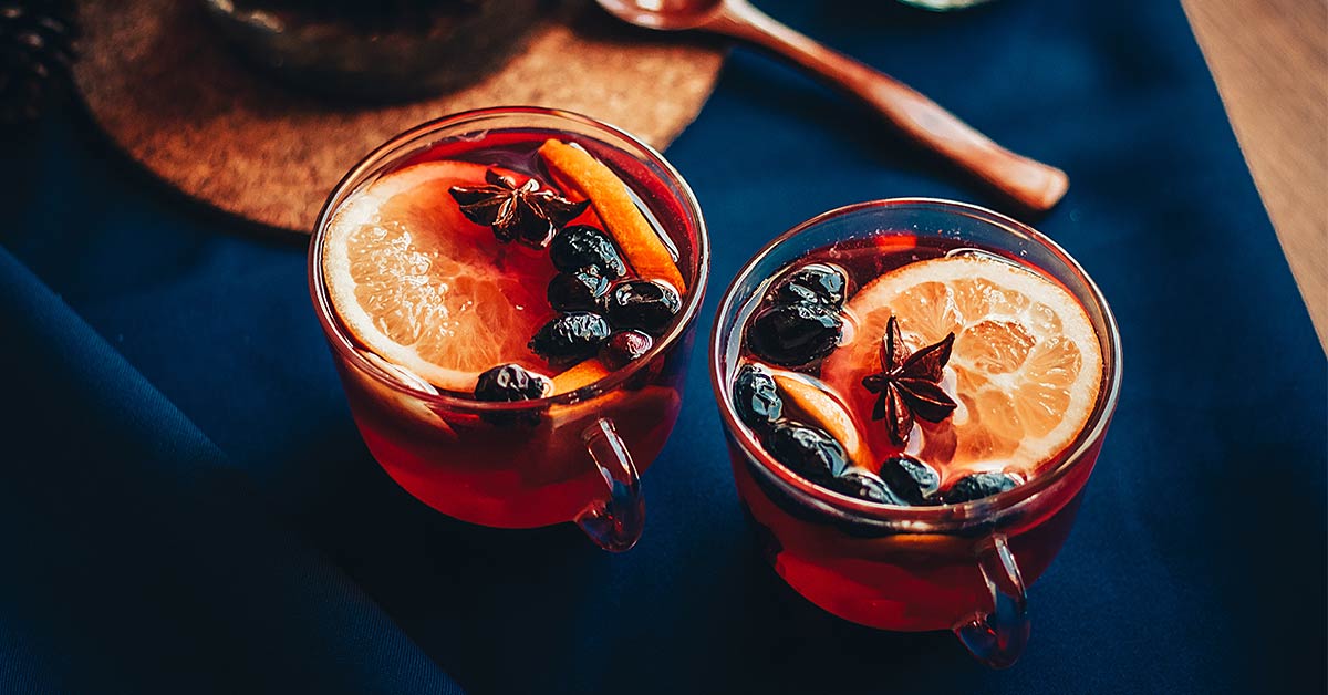 https://www.wineshopathome.com/wp-content/uploads/2022/03/Warm-Cozy-Mulled-Wines-Article-Cover-2022-1200x628-1.jpg